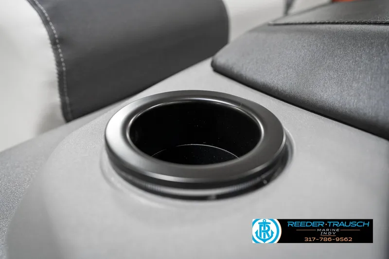Slide: The Image of Cup holder on 2025 Bennington 22 SSB boat interior, featuring sleek design and black trim. - 45