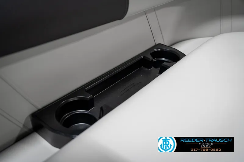 Slide: The Image of Cup holders on 2025 Bennington 22 SSB boat interior, featuring sleek design and functionality. - 47