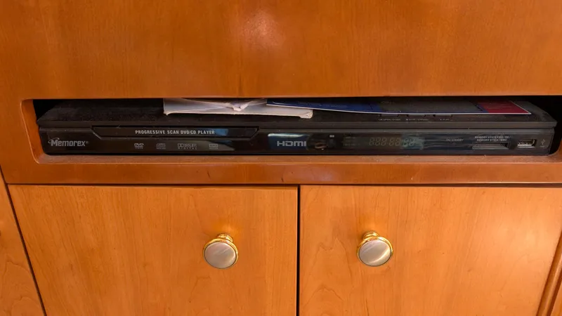 Slide: The Image of DVD player in wooden cabinet on 2004 Meridian 408 Motor Yacht. - 31
