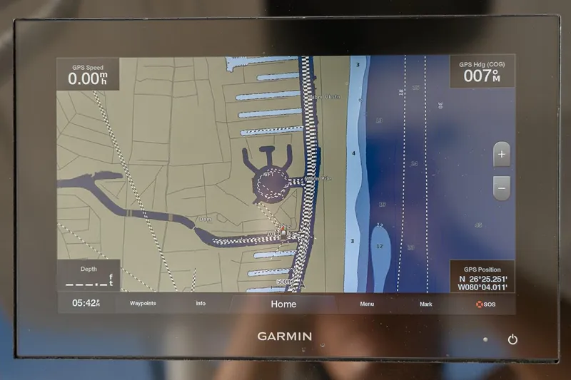 Slide: The Image of Garmin GPS display on 2021 Scout 355 LXF boat showing nautical map. - 23