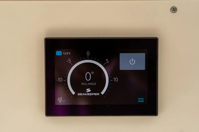 Slide: The Image of Seakeeper control display on 2021 Scout 355 LXF boat, showing roll angle and power status. - 28
