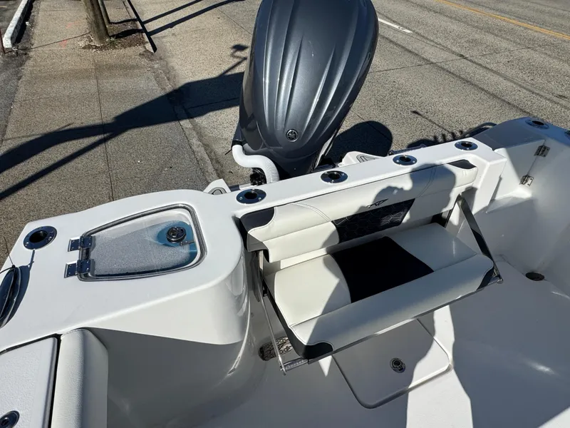 Slide: The Image of 2025 Tidewater 232 CC Adventure boat with sleek design and modern features. - 3