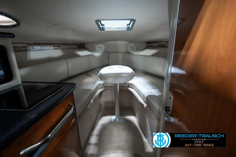 Slide: The Image of Interior of 2000 Chaparral Signature 240 boat with seating and table. - 17