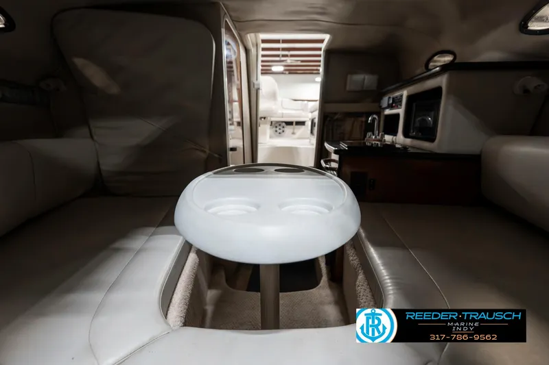 Slide: The Image of Interior of 2000 Chaparral Signature 240 boat with seating and table. - 18