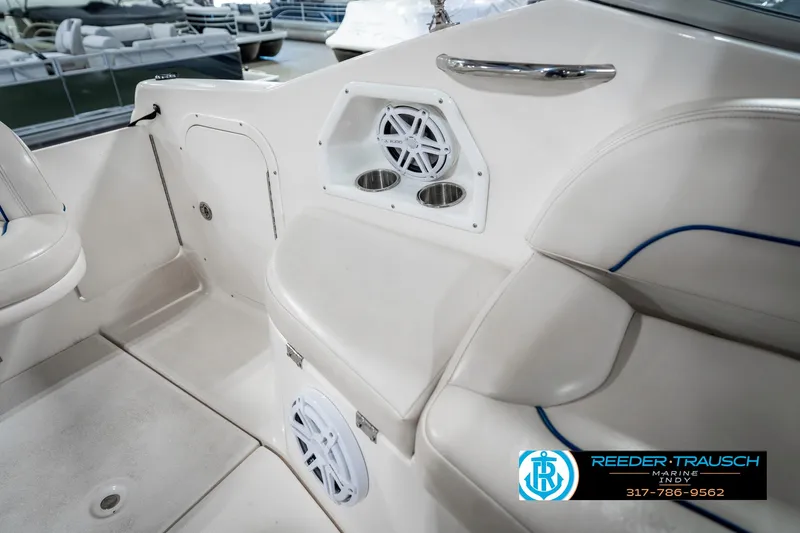 Slide: The Image of 2000 Chaparral Signature 240 boat interior with speakers and seating. - 24
