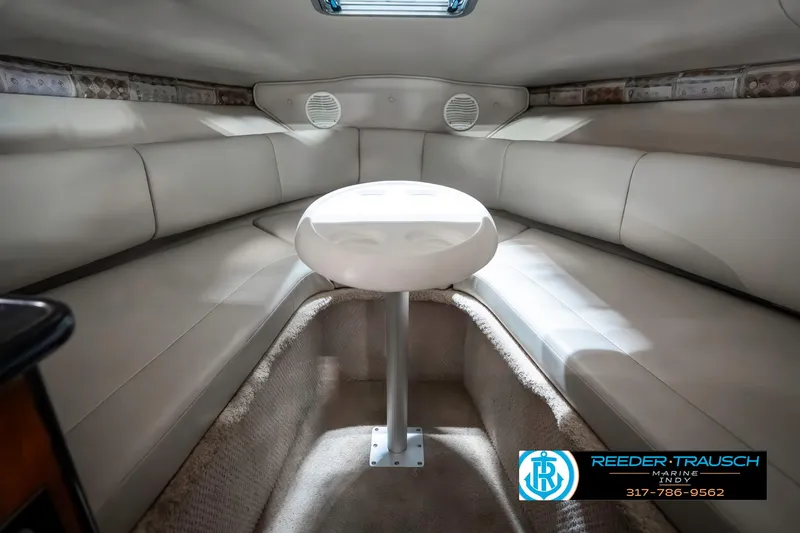 Slide: The Image of Interior of 2000 Chaparral Signature 240 boat with seating and table. - 32