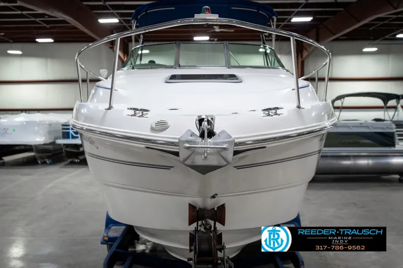 Slide: The Image of 2000 Chaparral Signature 240 boat in indoor showroom, front view. - 4