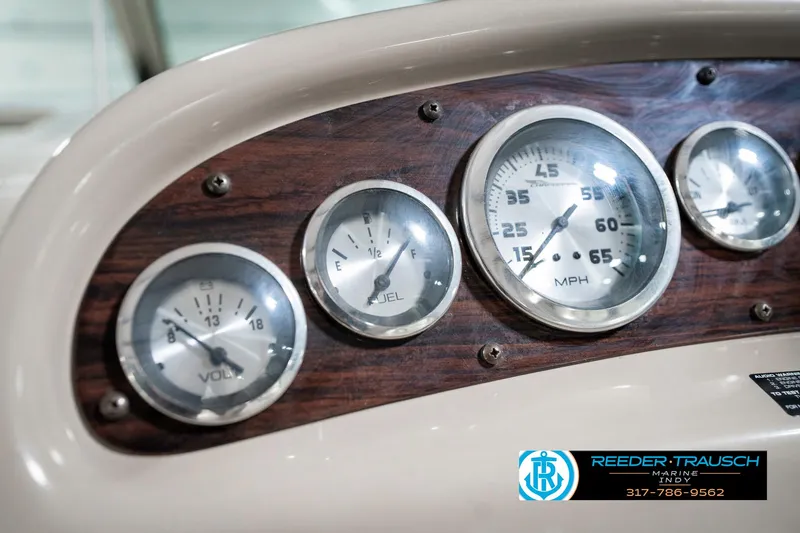 Slide: The Image of Dashboard gauges of a 2000 Chaparral Signature 240 boat, featuring speedometer and voltmeter. - 41