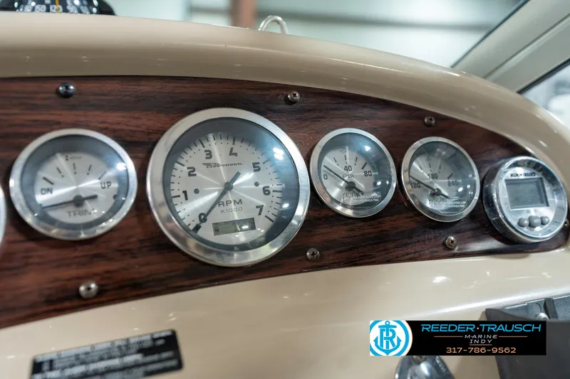 Slide: The Image of Dashboard gauges of a 2000 Chaparral Signature 240 boat. - 42
