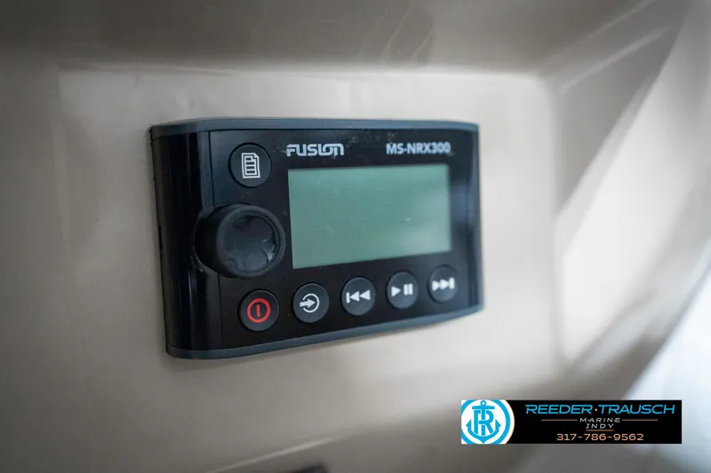 Slide: The Image of Fusion MS-NRX300 stereo control on 2000 Chaparral Signature 240 boat dashboard. - 46