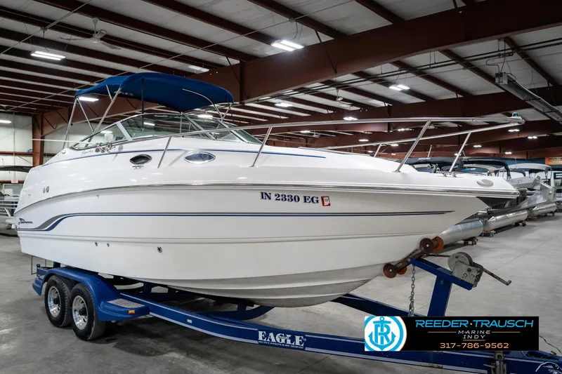 Slide: The Image of 2000 Chaparral Signature 240 boat on trailer in indoor showroom. - 5