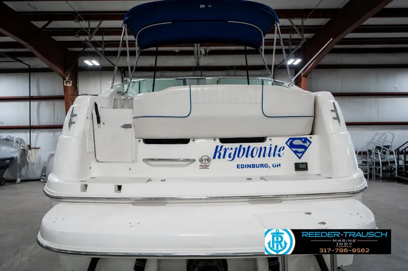Slide: The Image of 2000 Chaparral Signature 240 boat with "Kryptonite" decal in indoor storage. - 8