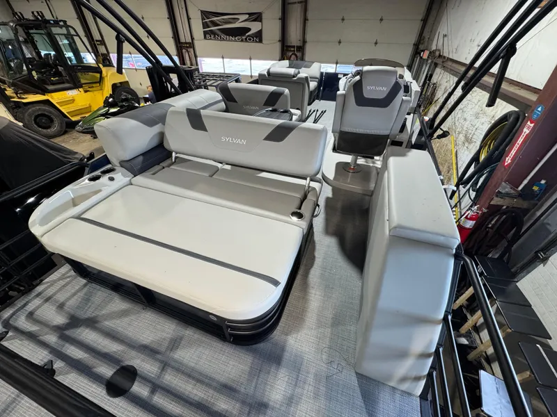 Slide: The Image of 2025 Sylvan L3 CLZ pontoon boat interior with spacious seating and modern design. - 9