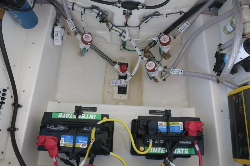 Slide: The Image of Electrical system of 2025 Robalo 266 Cayman boat with batteries and wiring. - 36
