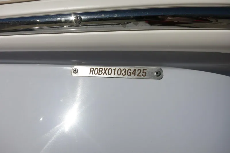 Slide: The Image of 2025 Robalo 266 Cayman boat hull identification number plate. - 9