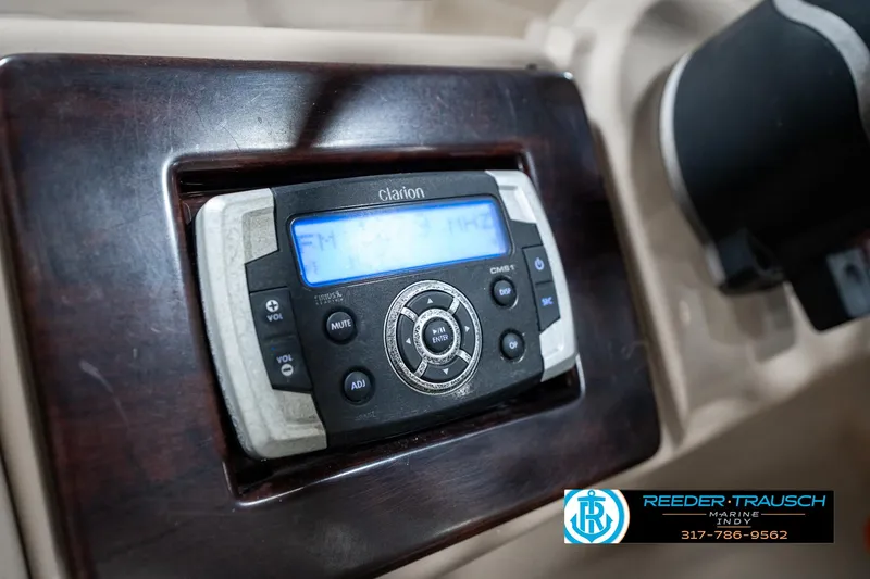 Slide: The Image of Clarion audio system in 2014 Bennington 522CR boat dashboard. - 37