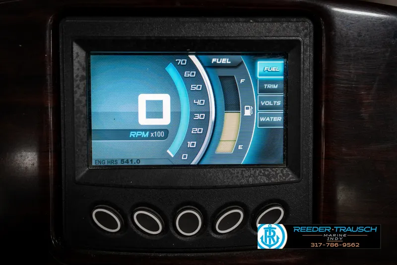Slide: The Image of Dashboard display of a 2014 Bennington 522CR boat showing RPM and fuel levels. - 39