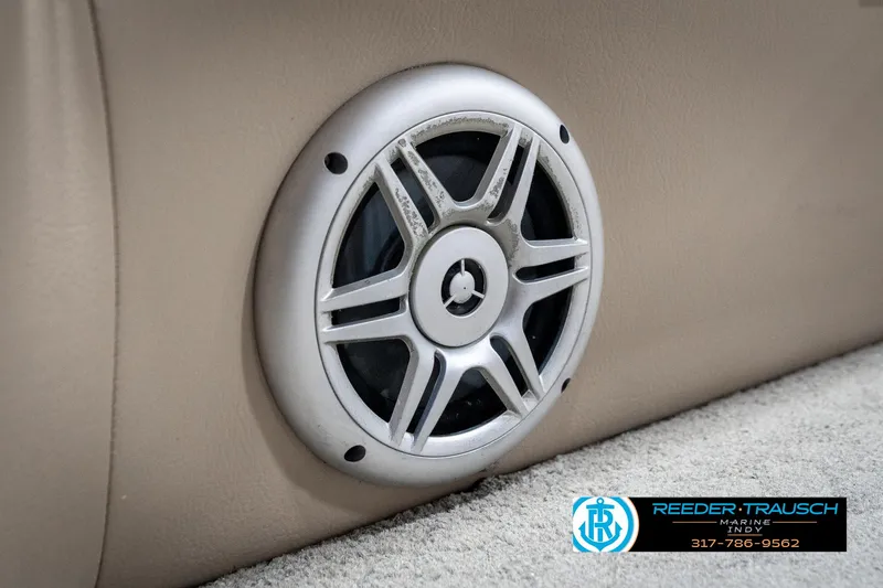 Slide: The Image of Speaker on a 2014 Bennington 522CR boat interior, featuring Reeder-Trausch branding. - 45