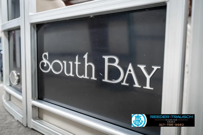 Slide: The Image of 2014 Bennington 522CR pontoon boat with "South Bay" branding, Reeder-Trausch Marine logo visible. - 49