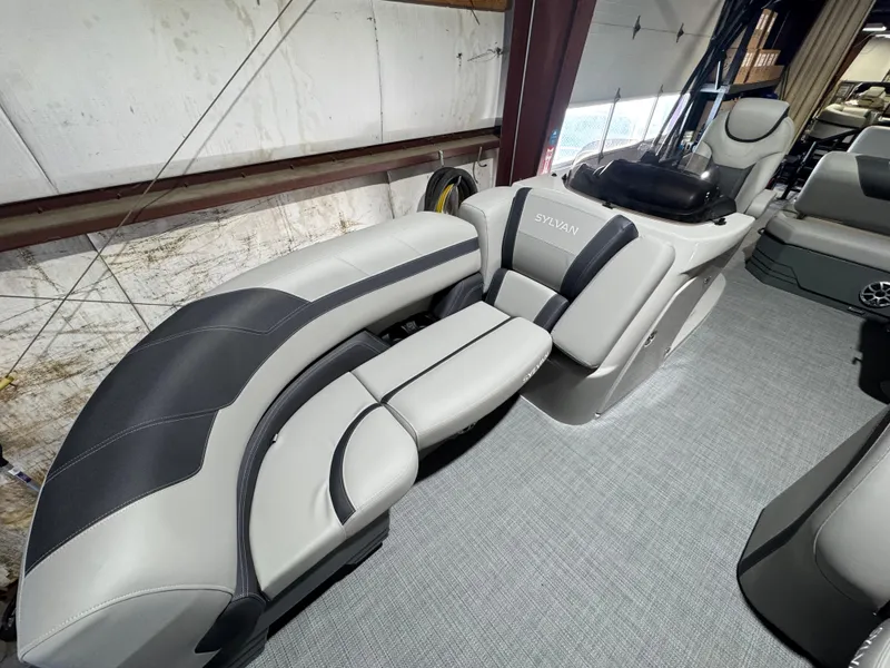 Slide: The Image of 2025 Sylvan L3 DLZ boat interior with sleek gray seating and modern design. - 2