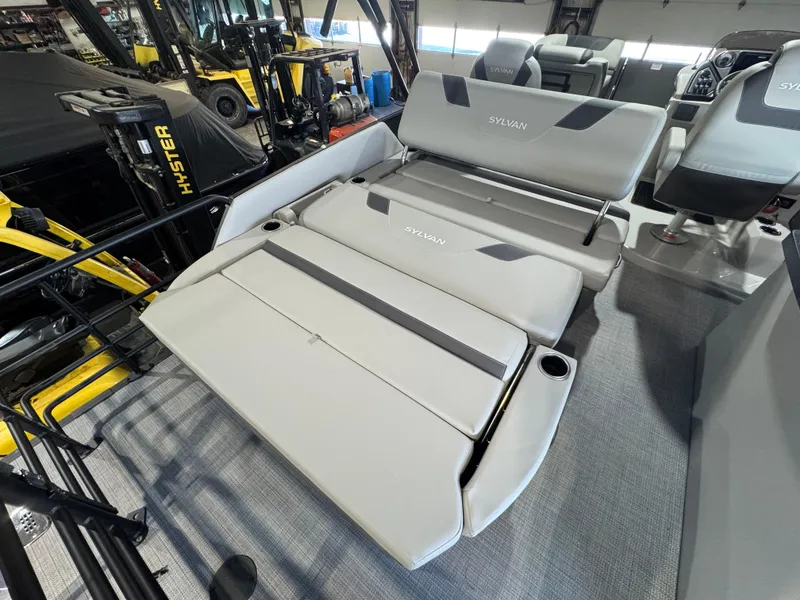 Slide: The Image of 2025 Sylvan L3 DLZ boat interior with adjustable seating and modern design. - 9