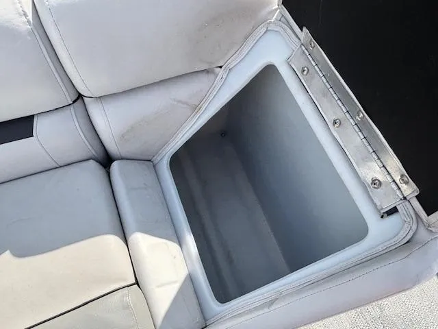 Slide: The Image of Open storage compartment in Sweetwater 2286 boat seat, 2022 model. - 19