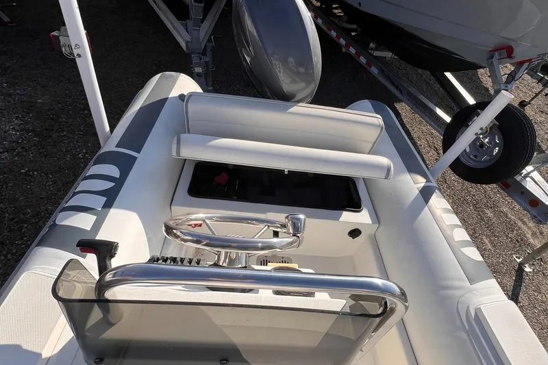 Slide: The Image of Novurania DL 400 inflatable boat, 2020 model, interior view with steering console and seating. - 5