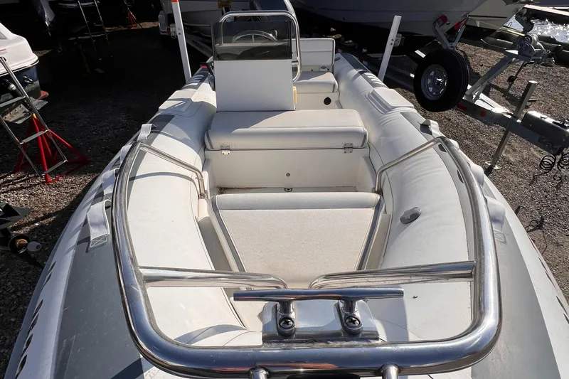 Slide: The Image of 2020 Novurania DL 400 boat with white seating and stainless steel railings. - 7