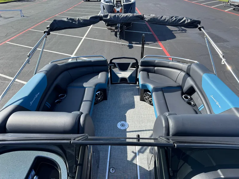 Slide: The Image of 2024 South Bay 25 Sport RS9-DC pontoon boat with spacious seating and modern design. - 6
