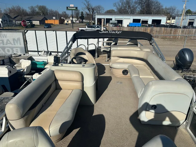 Slide: The Image of 2012 Sun Tracker Fishin' Barge 24 DLX pontoon boat with spacious seating and canopy. - 19