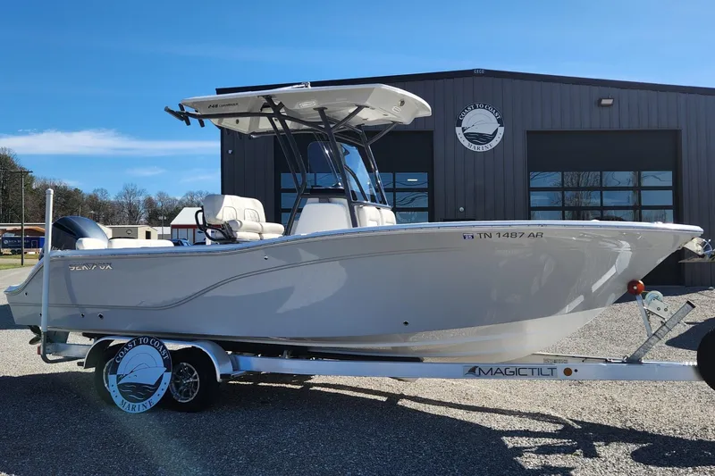 Slide: The Image of 2021 Sea Fox 248 Commander boat on trailer, parked outside a building. - 0