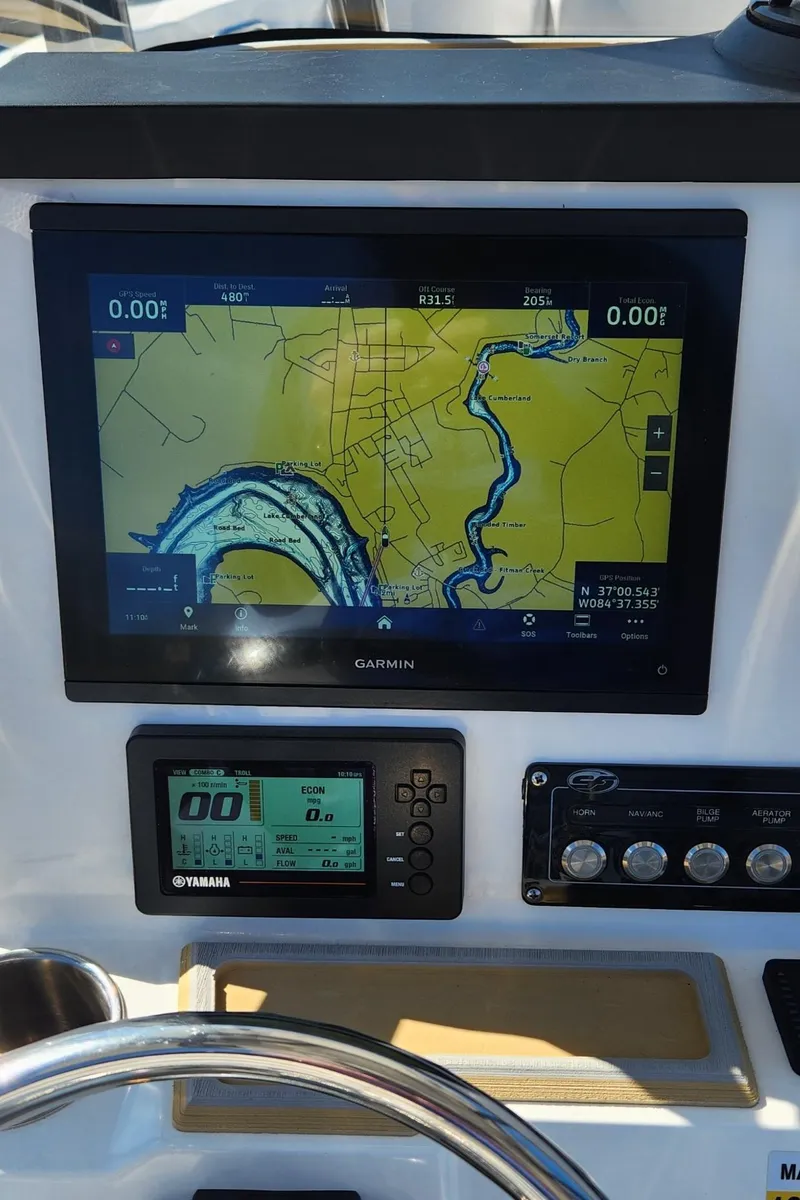 Slide: The Image of Dashboard of 2021 Sea Fox 248 Commander with navigation and control displays. - 10
