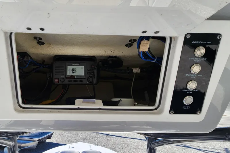 Slide: The Image of 2021 Sea Fox 248 Commander dashboard with electronic controls and wiring. - 11
