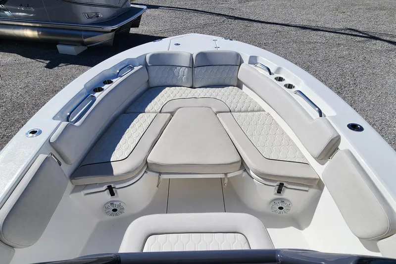 Slide: The Image of 2021 Sea Fox 248 Commander boat interior with cushioned seating and sleek design. - 13