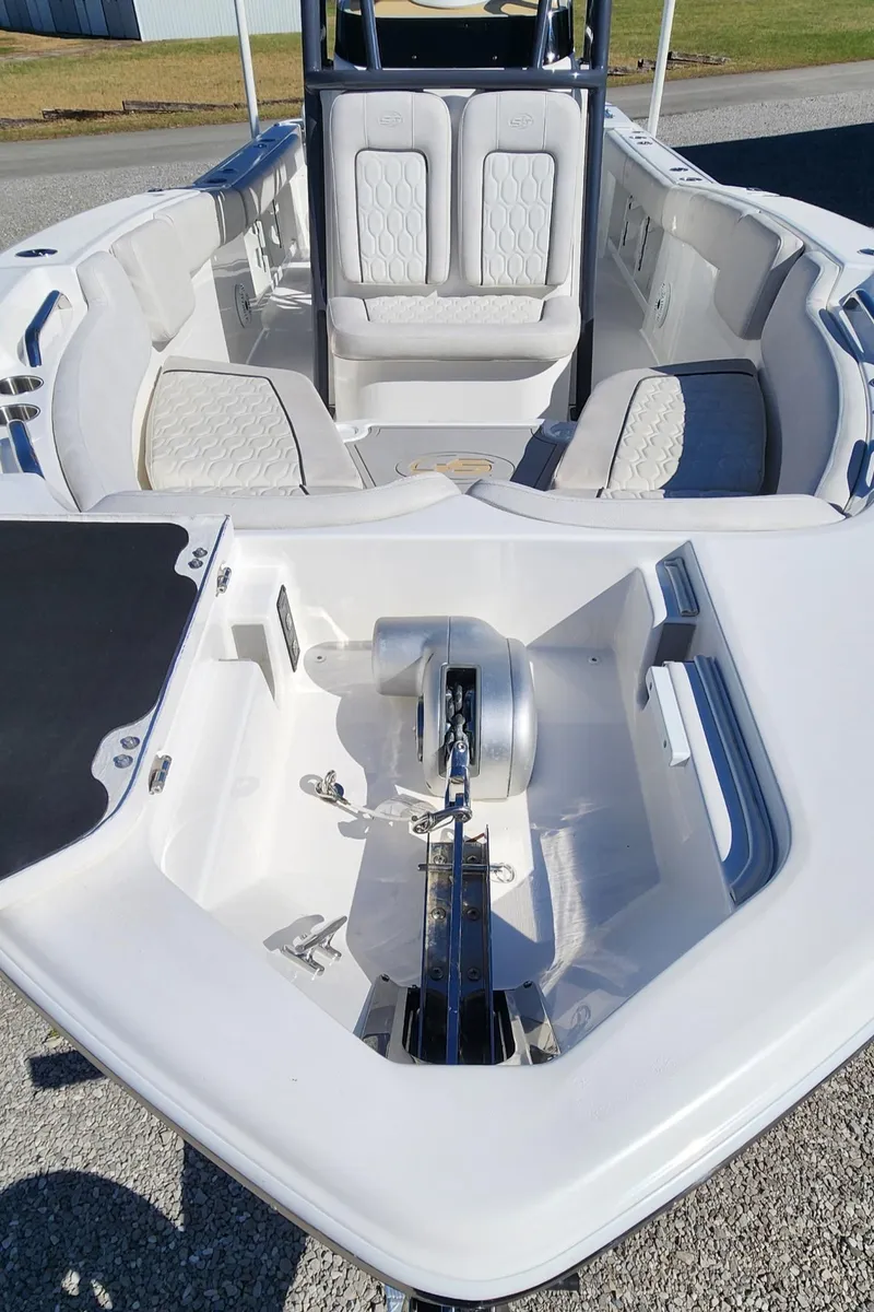 Slide: The Image of 2021 Sea Fox 248 Commander boat interior with seating and anchor compartment. - 15