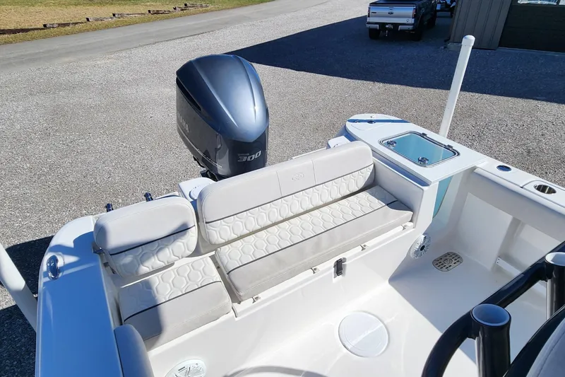 Slide: The Image of 2021 Sea Fox 248 Commander boat interior with seating and outboard motor. - 7