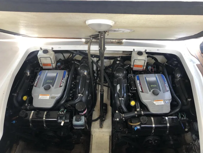 Slide: The Image of Twin engines in a 2012 Formula 31 PC boat engine compartment. - 12