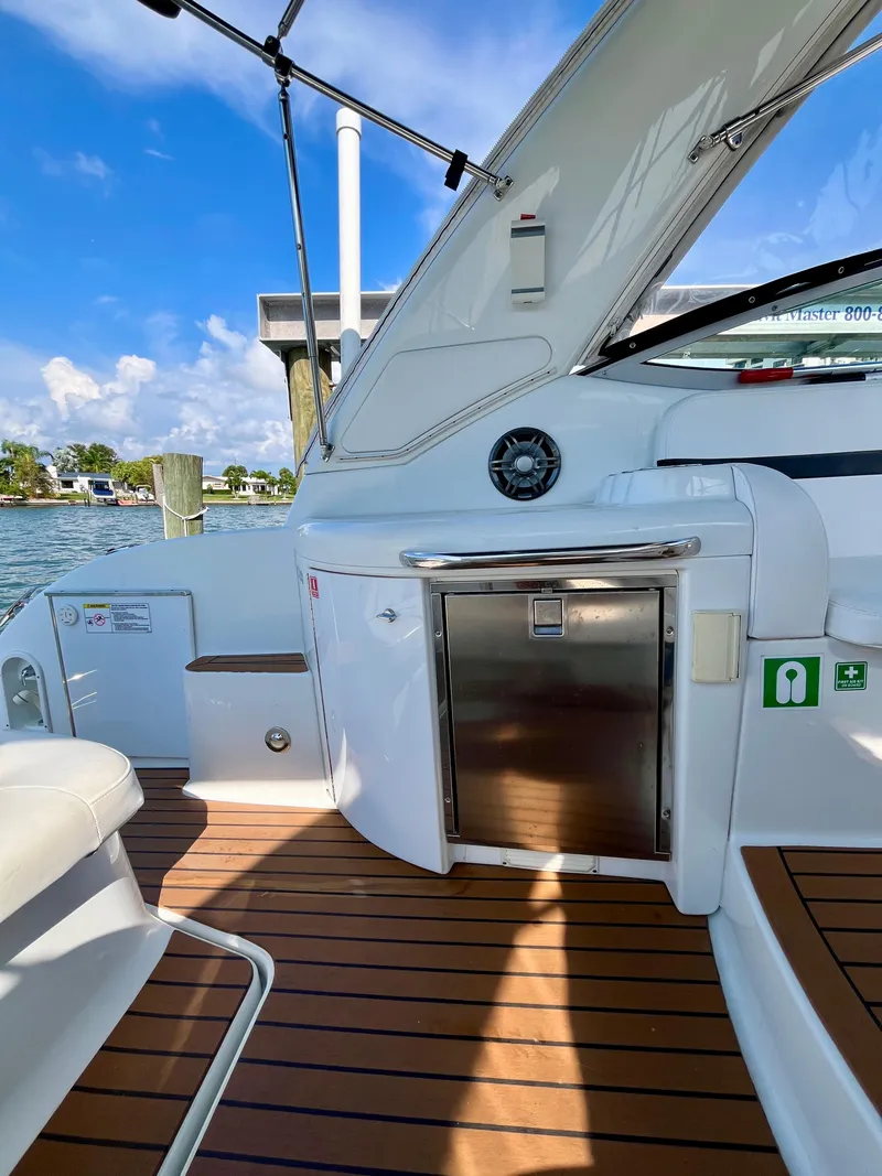 Slide: The Image of 2012 Formula 31 PC boat interior with sleek design and wooden flooring. - 17