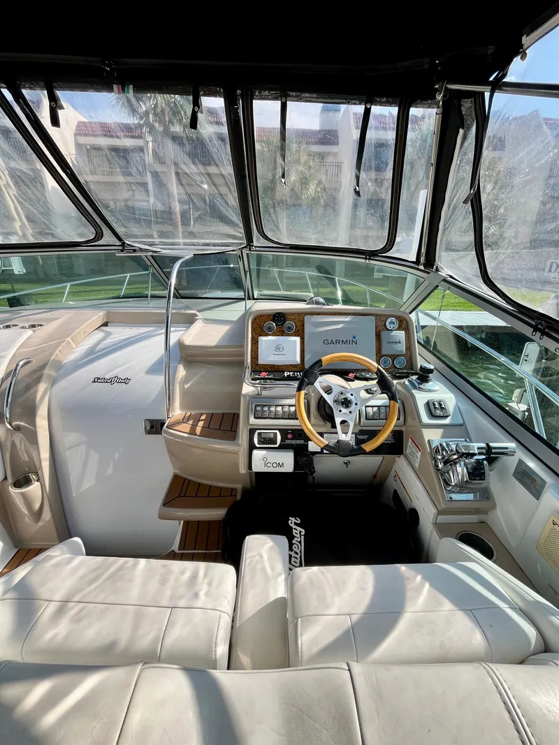Slide: The Image of 2012 Formula 31 PC yacht cockpit with modern navigation system and luxurious seating. - 19