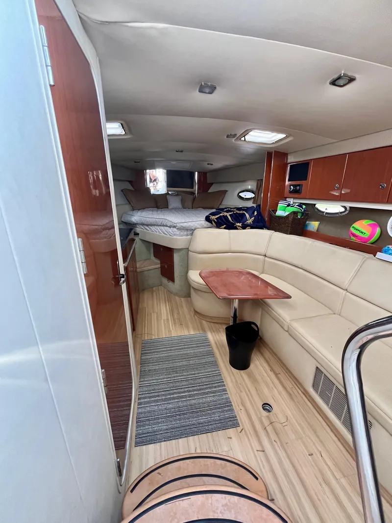 Slide: The Image of Interior of 2012 Formula 31 PC yacht with modern furnishings and cozy seating area. - 20