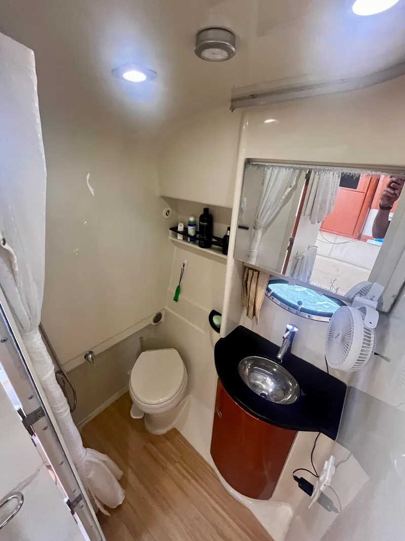 Slide: The Image of 2012 Formula 31 PC bathroom with modern fixtures and wood flooring. - 26