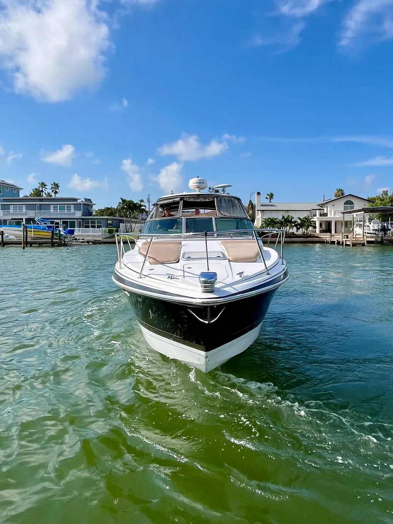 Slide: The Image of 2012 Formula 31 PC yacht cruising in sunny coastal waters. - 6