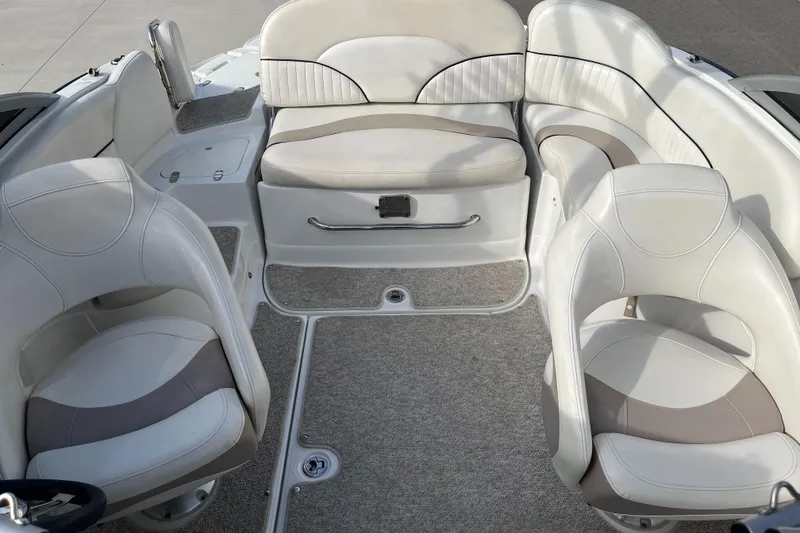 Slide: The Image of Interior of a 2013 Azure AZ238 boat with white and gray seating. - 12