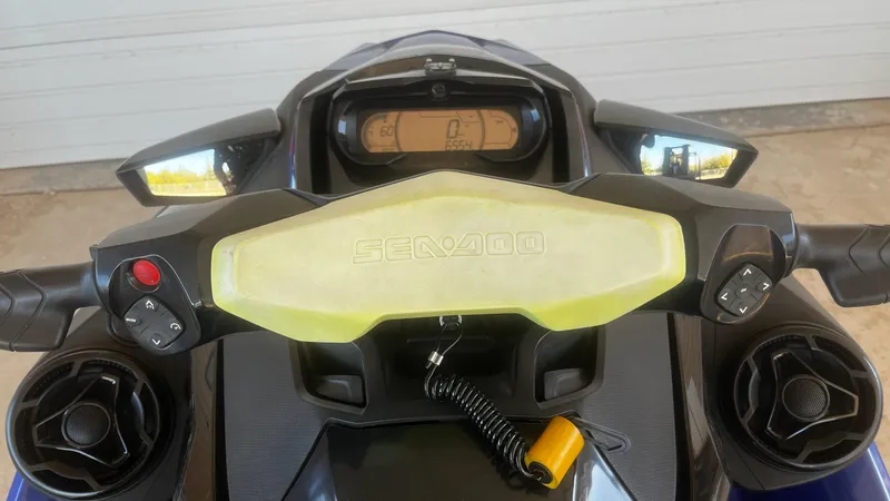 Slide: The Image of 2021 Sea-Doo Wake Pro 230 dashboard with controls and display panel. - 11