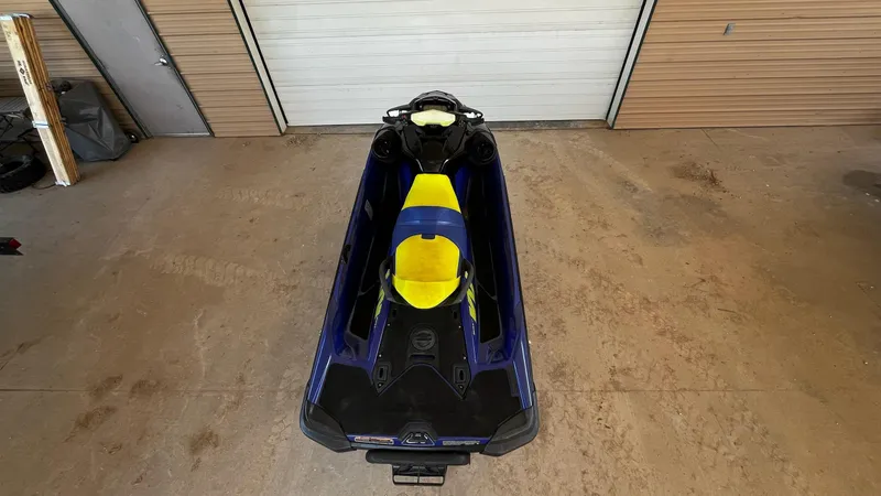 Slide: The Image of 2021 Sea-Doo Wake Pro 230 jet ski in a garage, top view. - 9