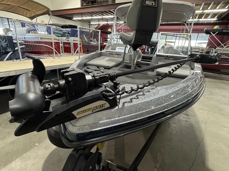 Slide: The Image of 2018 Ranger 212LS boat with trolling motor in showroom. - 6