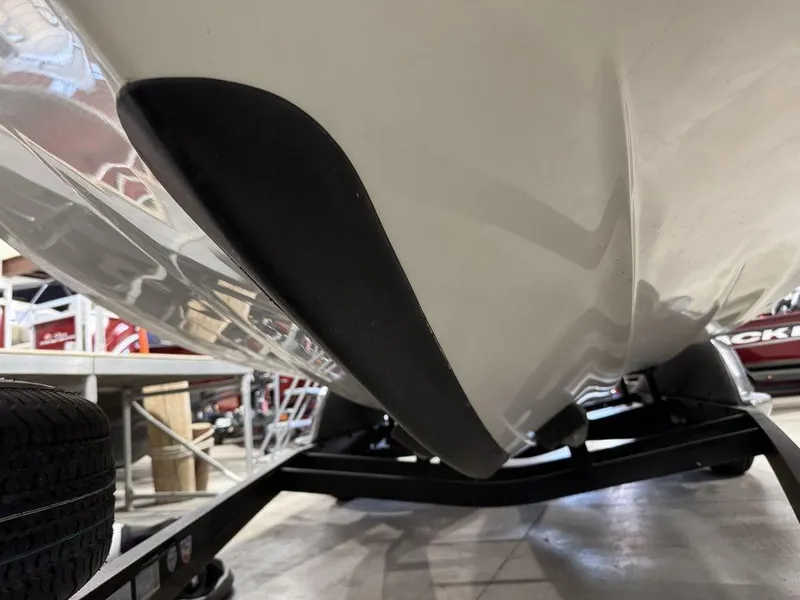 Slide: The Image of 2018 Ranger 212LS boat hull on trailer, close-up view. - 7