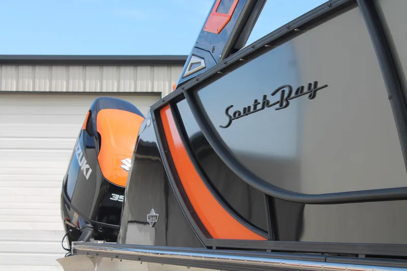 Slide: The Image of 2024 South Bay 25 Sport CR9-DC boat with Suzuki engine, sleek design. - 11