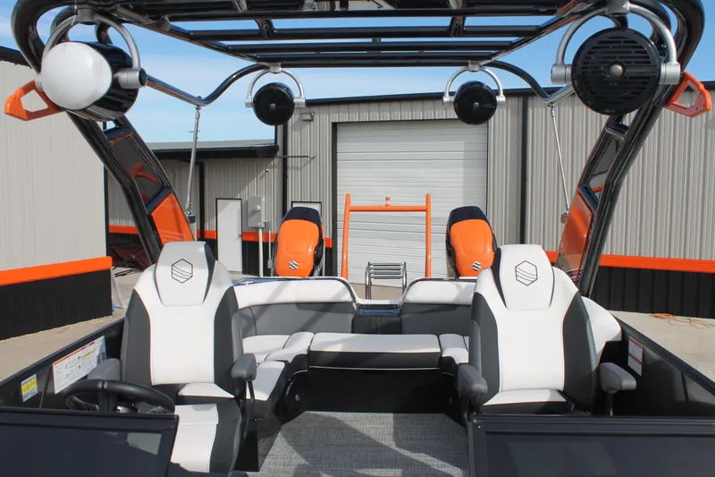 Slide: The Image of 2024 South Bay 25 Sport CR9-DC boat interior with modern seating and audio system. - 9