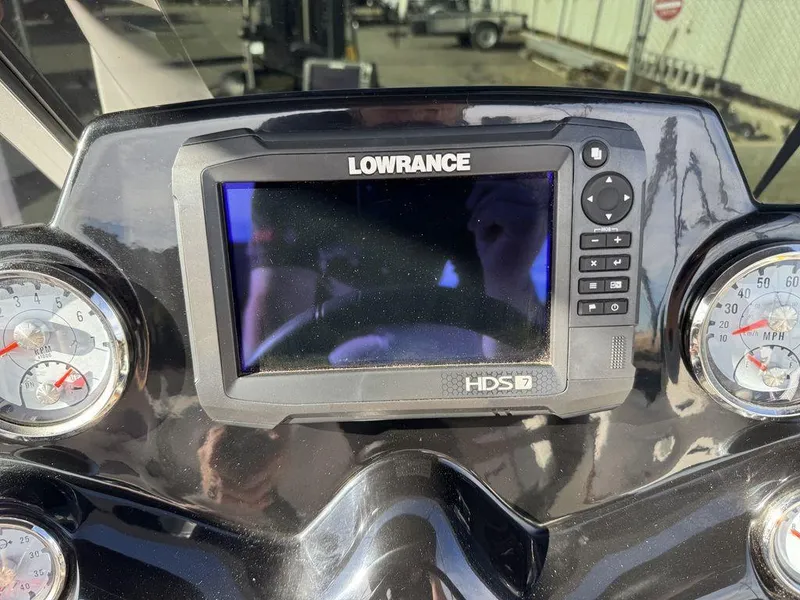 Slide: The Image of Lowrance HDS-7 display on 2018 Nitro Z19 Sport dashboard with gauges. - 19